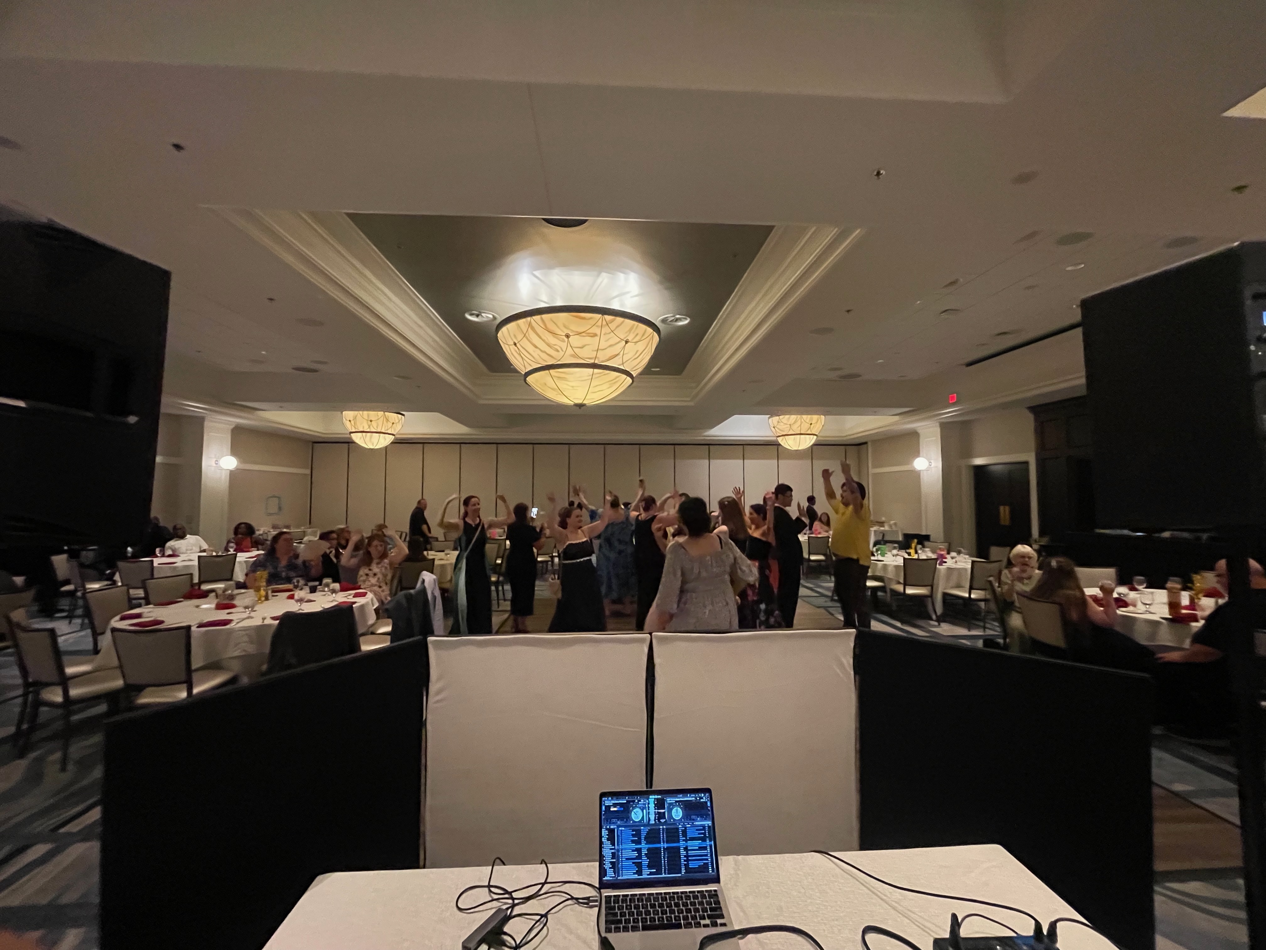 Packed dance floor at a formal event